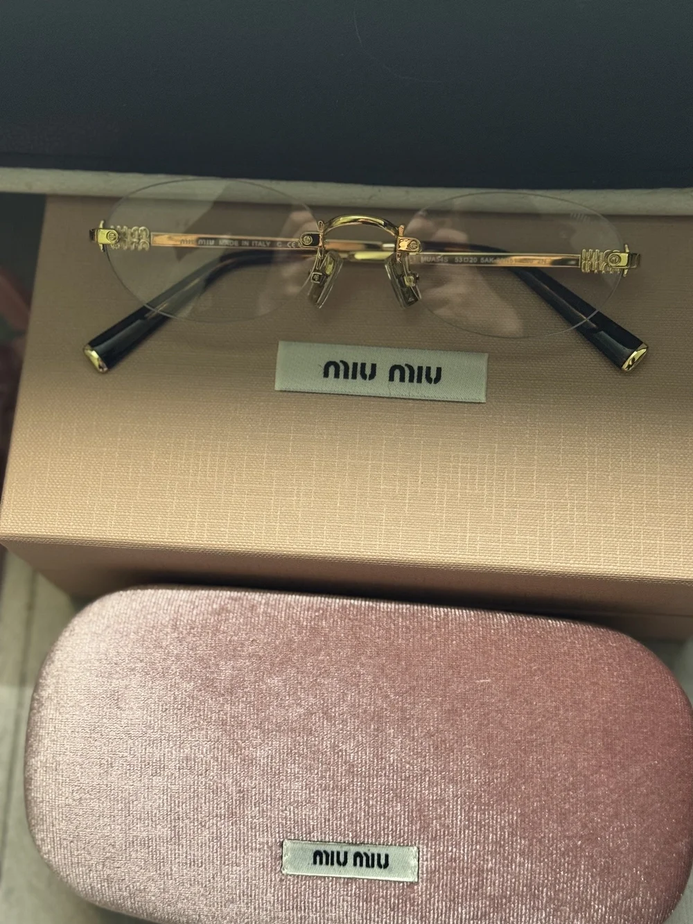 MIUMIU. miu rim‑less